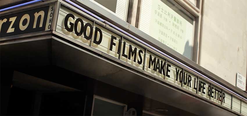 A sign on the Curzon Soho cinema that reads 'Good films makes your life better'. Links to a voc pop video of Londoners talking about the importance of video.